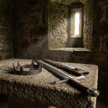 An iron crown and sword on an altar