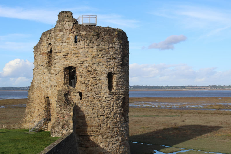 The north-east tower of Flint Castle with the Dee Estuary behind it, October 2026