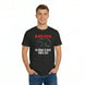 Man wearing a black t-shirt with red and white text and graphics on a white background