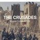 Front cover of the 'An Edugas GCSE History Revision Guide' featuring a historical illustration of Crusaders and siege towers, with the title 'THE CRUSADES' and publisher branding 'Histories and Castles'.