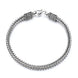 Silver braided bracelet on a white background