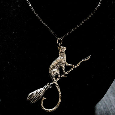 Silver Cat on a Broomstick Necklace | Witchy Feline Pendant & Gothic Jewellery Necklace