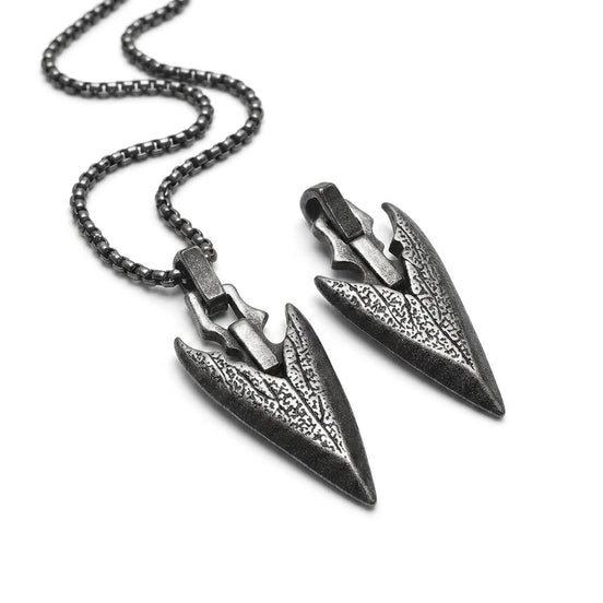 Viking Spearhead pendants on a white background, one with a chain and the other without