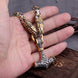 Decorative bracelet with intricate designs on a hand against a wooden surface