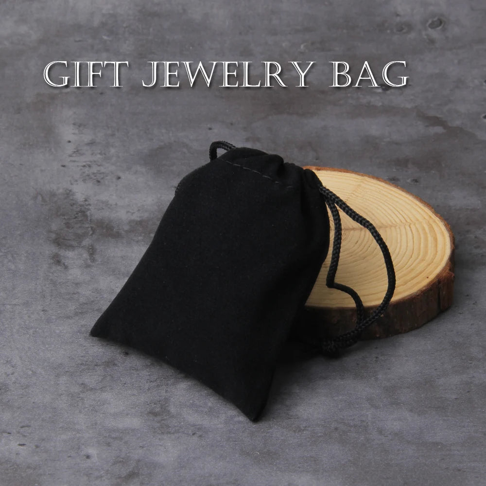 Black jewelry bag on a wooden block with 'Gift Jewelry Bag' text on a gray background
