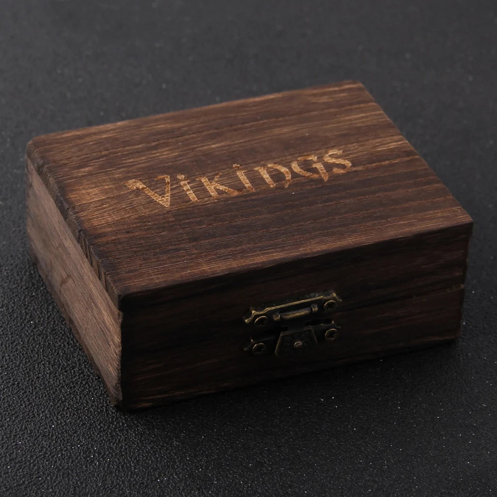 Wooden box with 'Vikings' engraving on a dark background