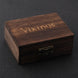 Wooden box with 'Vikings' engraving on a dark background