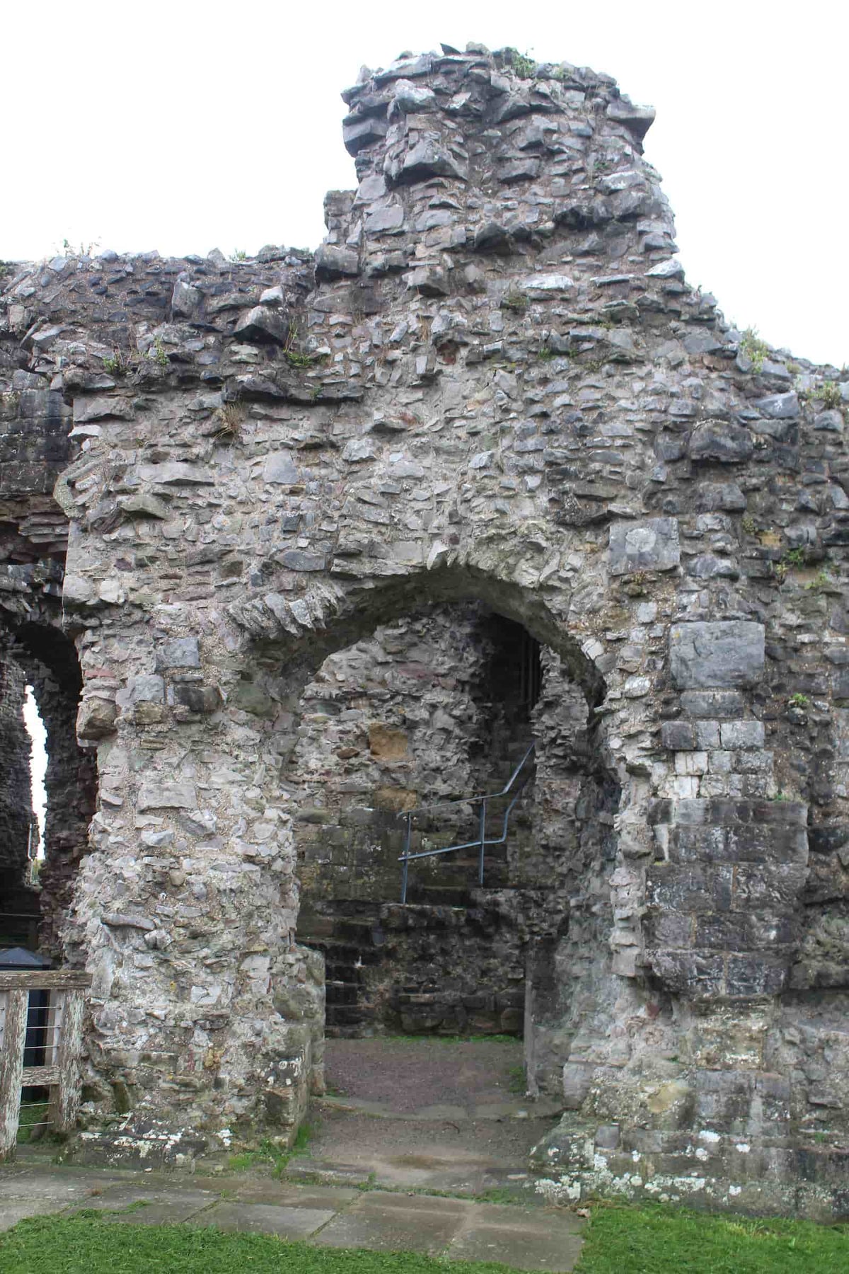 Ruined arched stone doorway at Denbigh Castle, October 2026