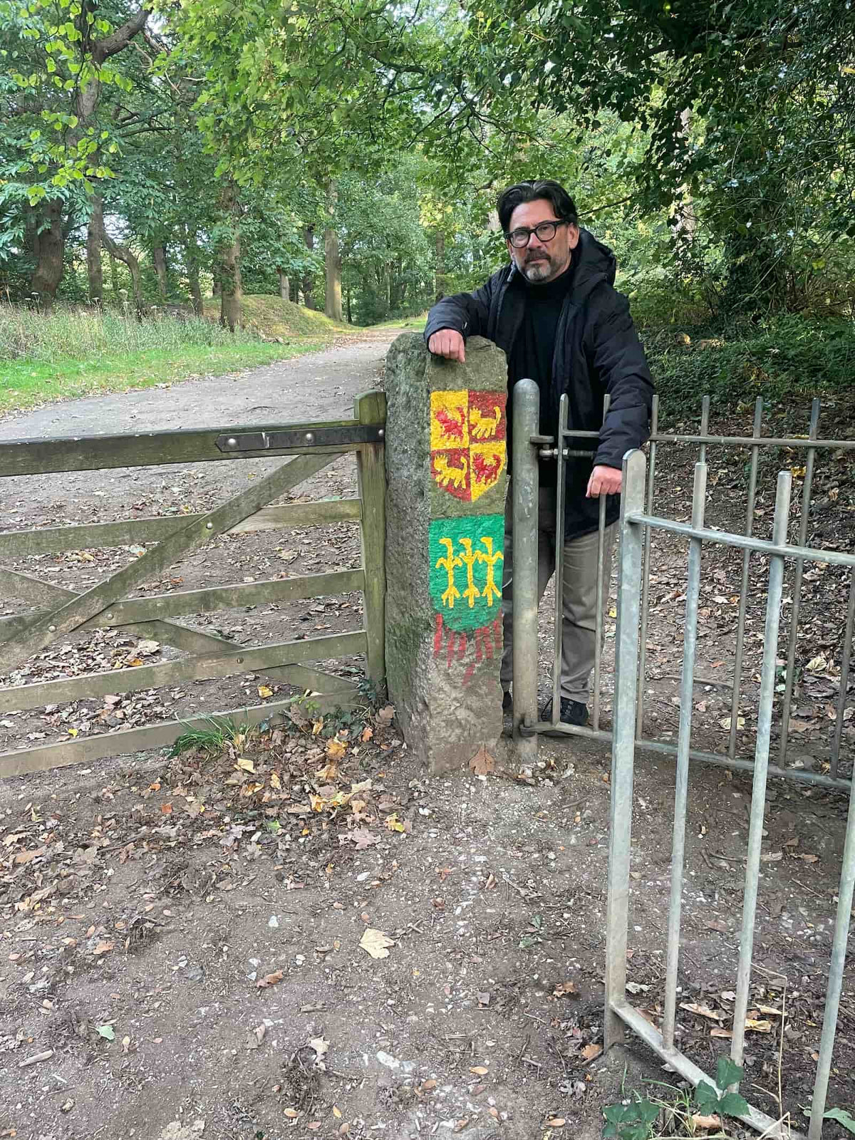 Simon A. Williams, history communicator and storyteller, at the woodland gate on the path to Ewloe Castle, October 2026