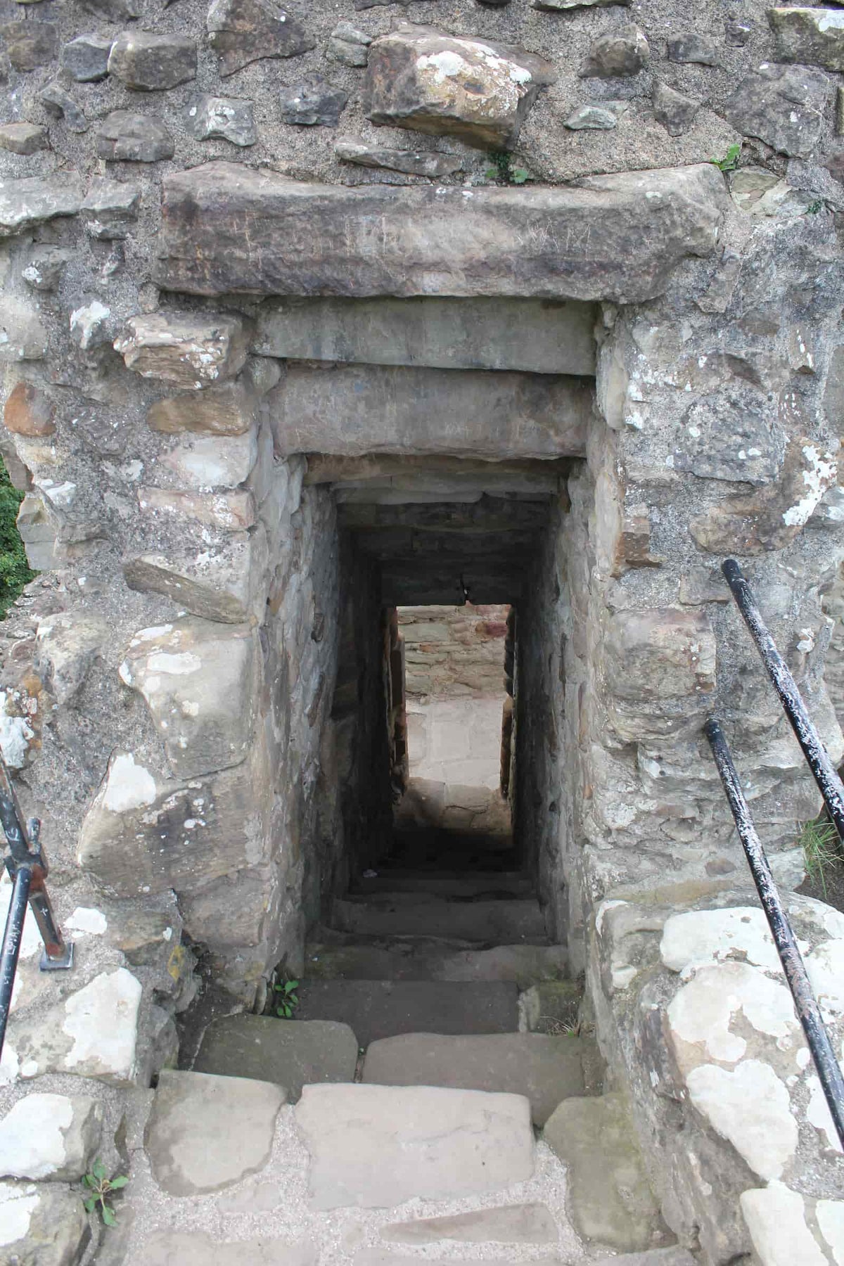 Stone steps and narrow entrance passage into the Welsh Tower at Ewloe Castle, October 2026