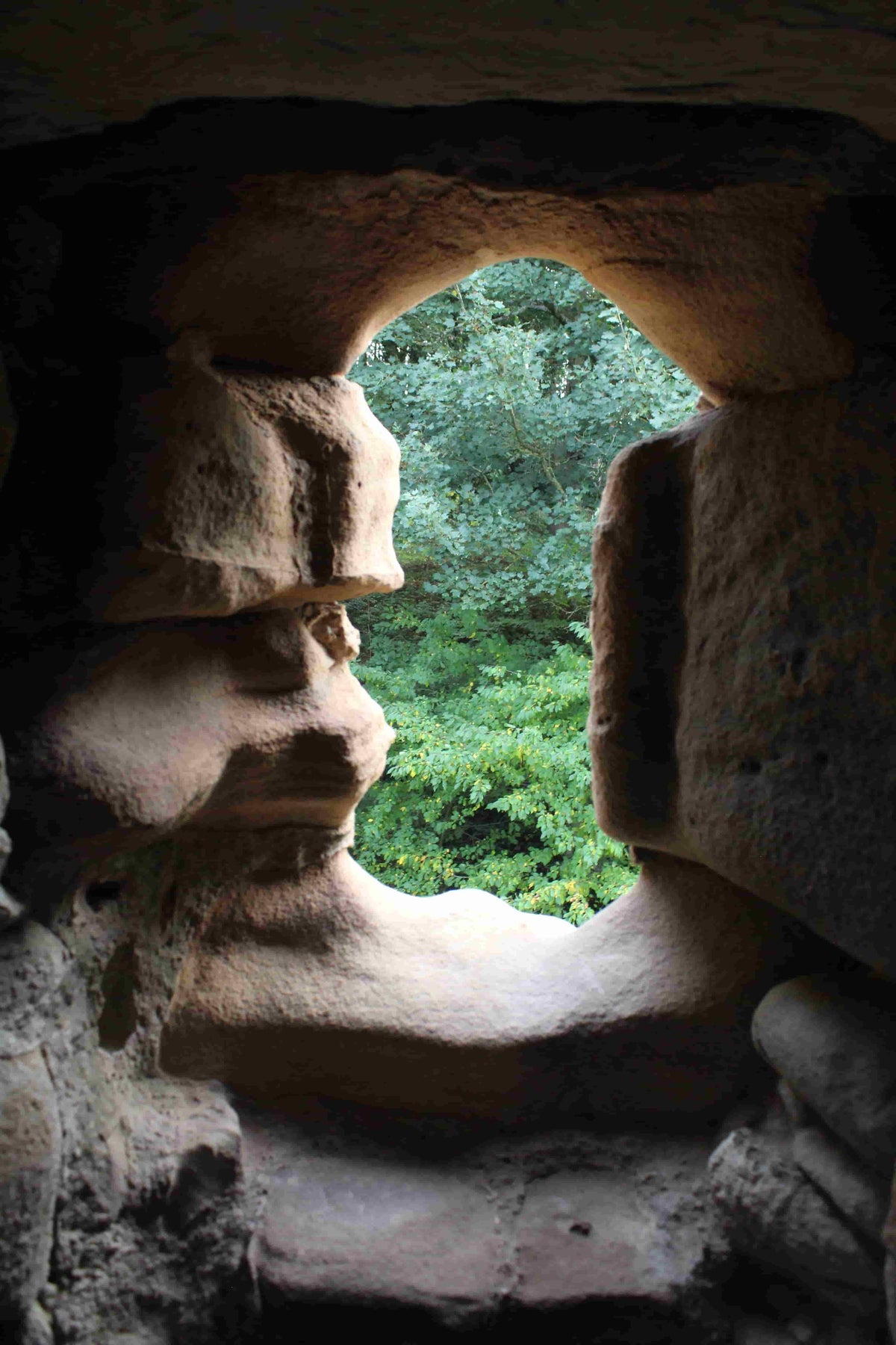 Looking out through a sandstone window embrasure in the Welsh Tower at Ewloe Castle, October 2026