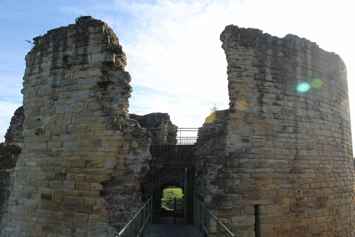 The entrance passage into the inner ward of Flint Castle between its ruined towers, October 2026
