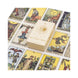 A deck of classic fortune telling tarot cards with its cream-colored box in the center, surrounded by several illustrated cards on a white background.