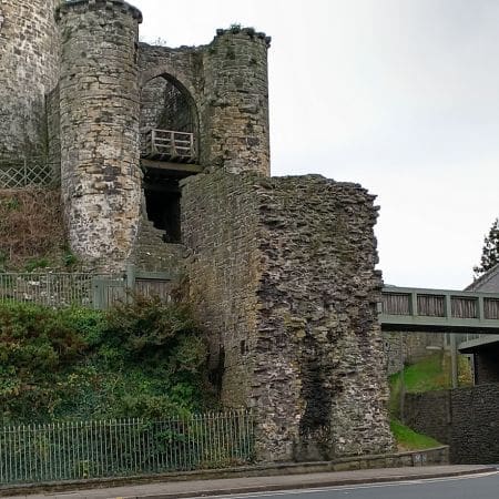 the thick walls of Conwy Castle