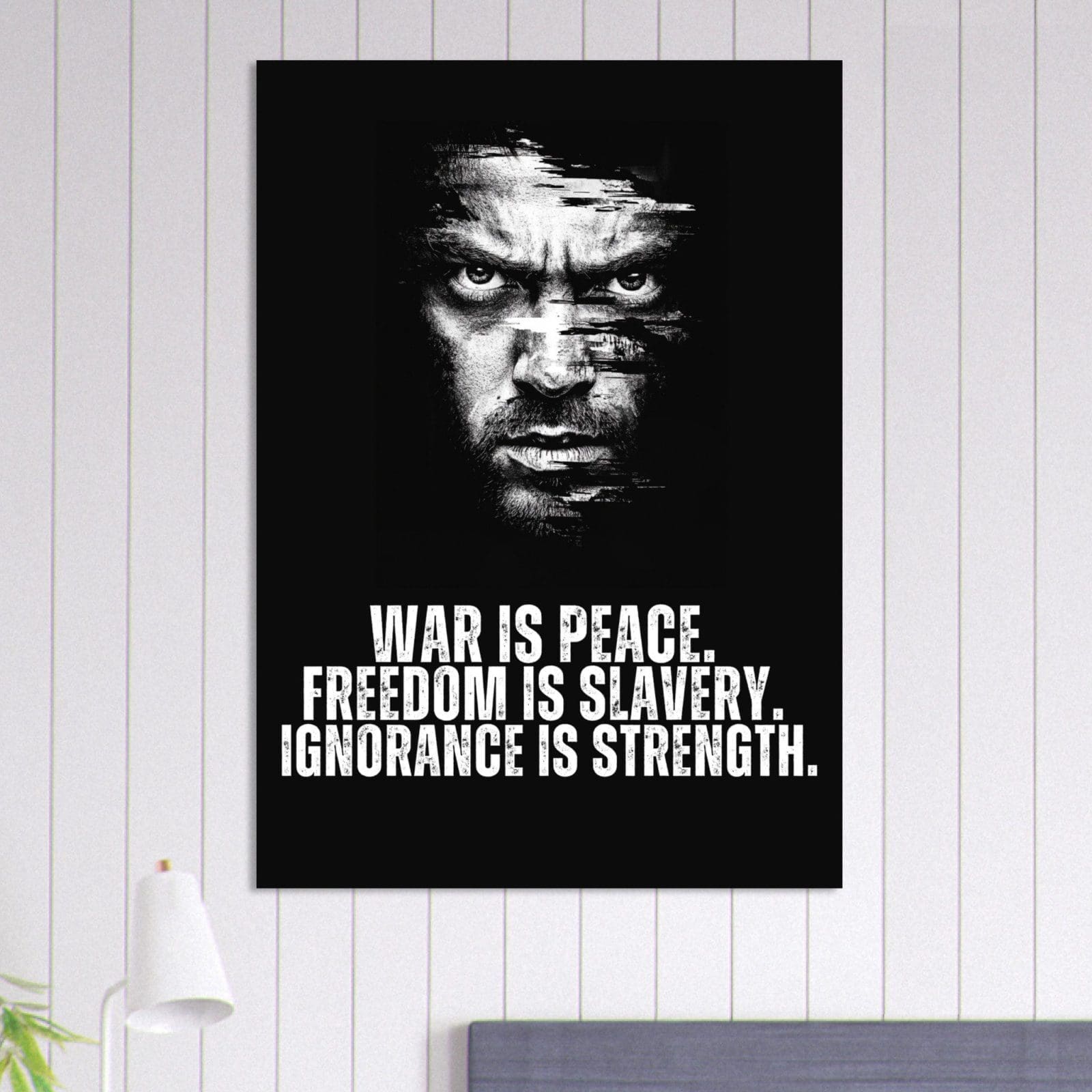 The 1984 Book Inspired Poster features a stern face veiled in dark streaks, with bold white text: WAR IS PEACE. FREEDOM IS SLAVERY. IGNORANCE IS STRENGTH—an iconic tribute to George Orwell’s classic novel.
