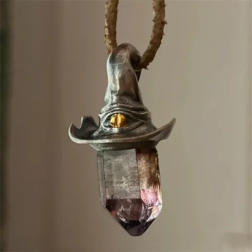 Amethyst witch hat pendant with hexagonal crystal point, gothic mystical necklace with golden eye detail.